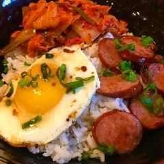 A picture of Steamed Rice with Fried Egg, Sausage & Kimchi.