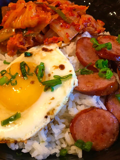 A picture of Steamed Rice with Fried Egg, Sausage & Kimchi.