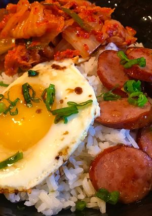 A picture of Steamed Rice with Fried Egg, Sausage & Kimchi.