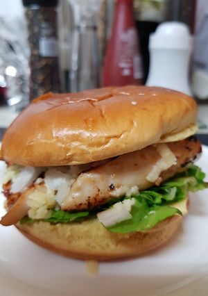 A picture of My grilled Chicken burger with Bonfire smoked Chedder cheese.😘.