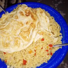 A picture of Indomie with Fried Eggs.