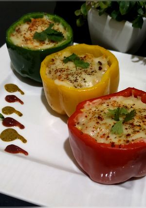A picture of Cheesy Keema Stuffed Capsicum.