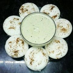 A picture of #chutney & dip#Coconut chutney with idli.