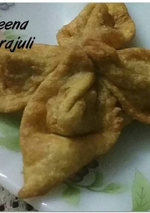 A picture of Flower shape matar potli.