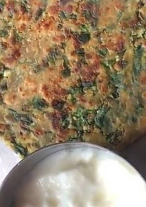 A picture of Palak paneer paratha.