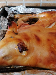 Una foto de Cochinillo al horno en Navidad