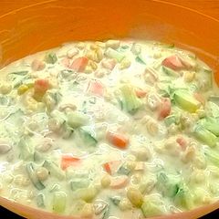 A picture of Curd Salad with Veggies & Fruits.