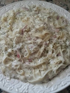 Una foto de Tagliatelle al vino y queso