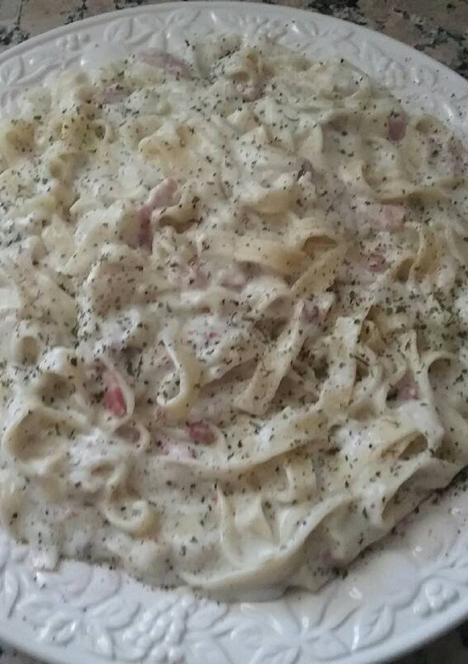 Una foto de Tagliatelle al vino y queso