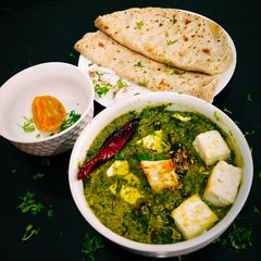 A picture of Cottage Cheese In Spinach Gravy Palak Paneer.