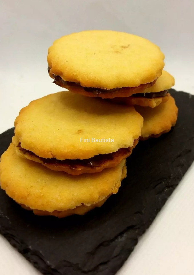 Una foto de Galletas de naranja rellenas de Nutella