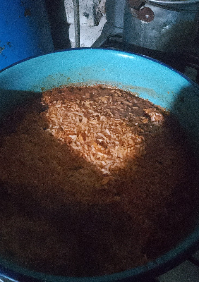 Una foto de Arroz rojo (Mexicano) 🇲🇽Con Puré 🍅