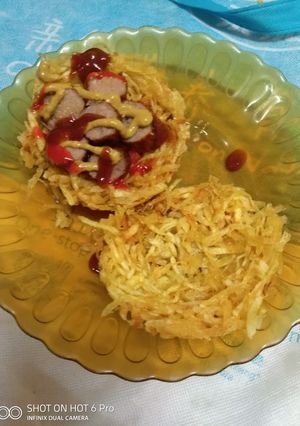 A picture of Potato basket with sausage#kidsrecipecontest#jikoniweeklychallen.