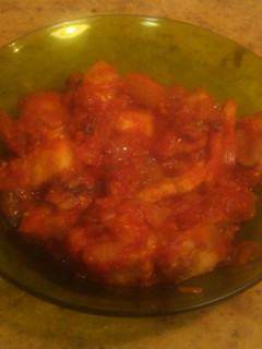 Una foto de Magro con tomate