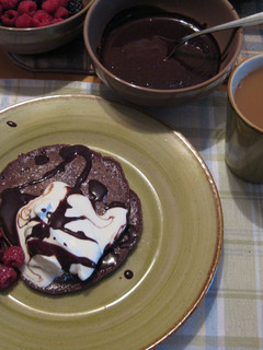 A picture of Chocolate Pancakewith Decadent Chocolate Sauce.