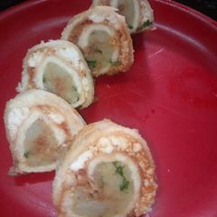 A picture of Paneer and potato Swiss rolls.