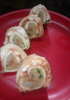 A picture of Paneer and potato Swiss rolls.