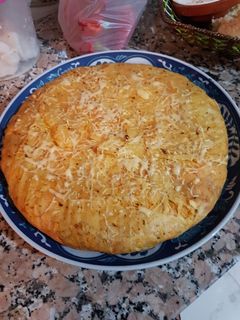 صورة لوصفة بسطيلة بنكهة الحوت
