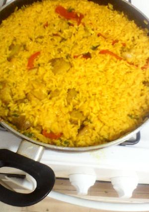 Una foto de Arroz con pollo y magra