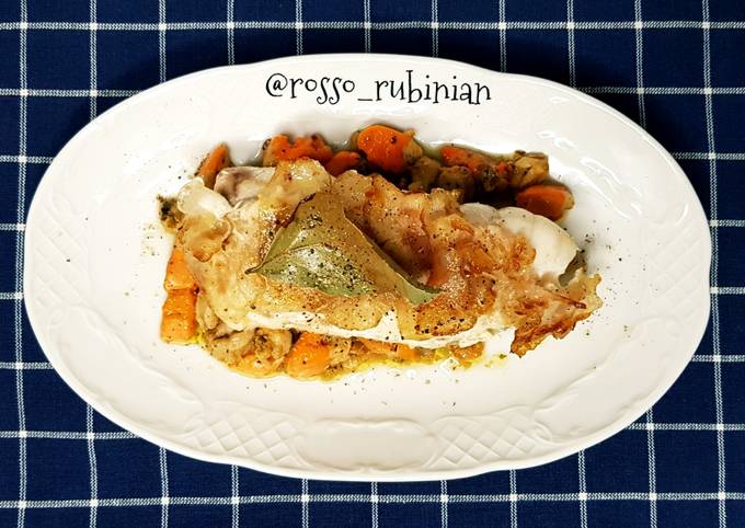 Rana pescatrice su corallo