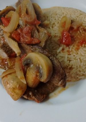 Una foto de Bifes al champignon