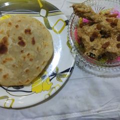 A picture of Chicken rezala.