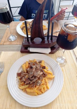 Una foto de Pasta con bistec
