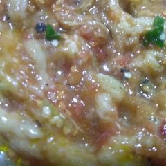 A picture of Begun pora(roasted brinjal).