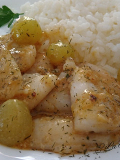 Una foto de Filetes de gallo con uvas