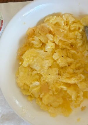 A picture of Scrambled Eggs with Cheese.