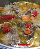 Filetes de cabeza de cerdo con hierbas aromáticas