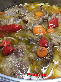 Una foto de Filetes de cabeza de cerdo con hierbas aromáticas