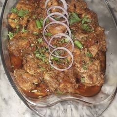A picture of Chicken Achari.