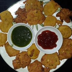 A picture of Mix veg and potato fritters.