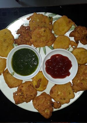 A picture of Mix veg and potato fritters.