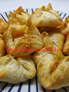 Foto di Fagottini brie e marmellata di arance