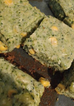 Una foto de Fainá de queso, brócoli y choclo