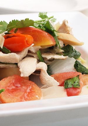 A picture of Tom Kha Gai with King Oyster Mushrooms.