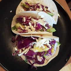 A picture of Chicken vegetable spicy tacos.