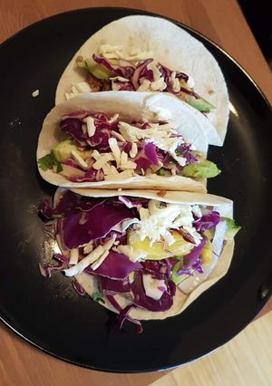A picture of Chicken vegetable spicy tacos.