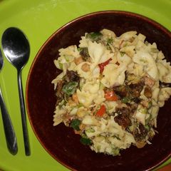 A picture of Pasta salad with ripe plantain and shrimps.