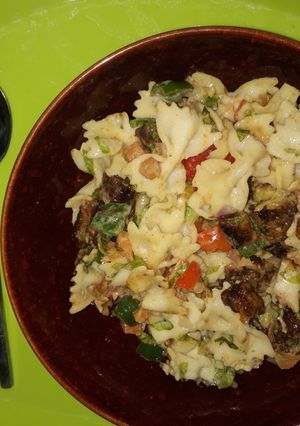 A picture of Pasta salad with ripe plantain and shrimps.