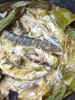 A picture of Mathi Pollichathu (Sardines cooked in Banana leaf).
