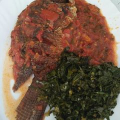 A picture of Wet fried fish with kales.
