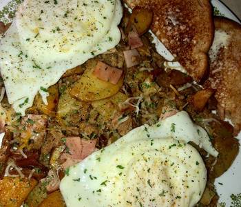 Best Recipe Sausage ham and fried potato skillet topped with eggs Delicious Nutritious