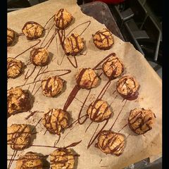 A picture of Chocolate dipped coconut macaroons.