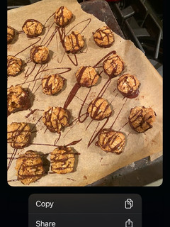 A picture of Chocolate dipped coconut macaroons.