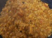 Una foto de guiso de pollo y batata