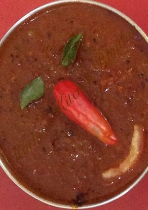 A picture of Tomato onion in spicy gravy.