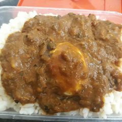 A picture of Rice with carrot stew.